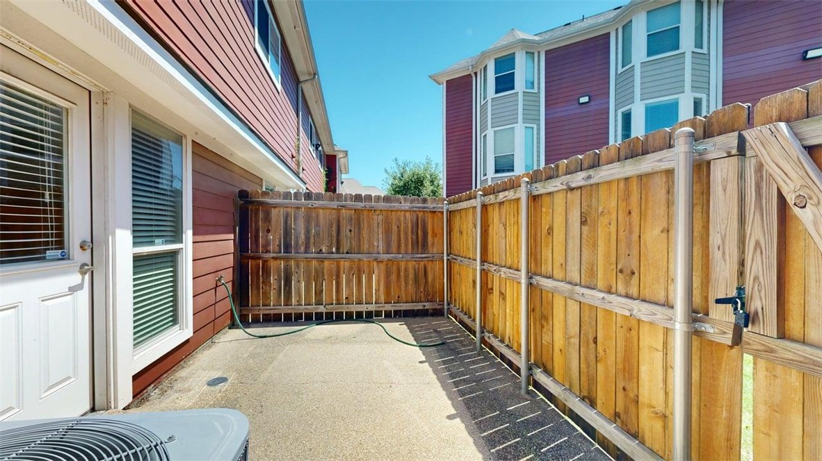 1198 Jones-Butler Road, Unit 2603 College Station, TX 77840 - Photo 26 of 29 a view of a balcony with wooden floor