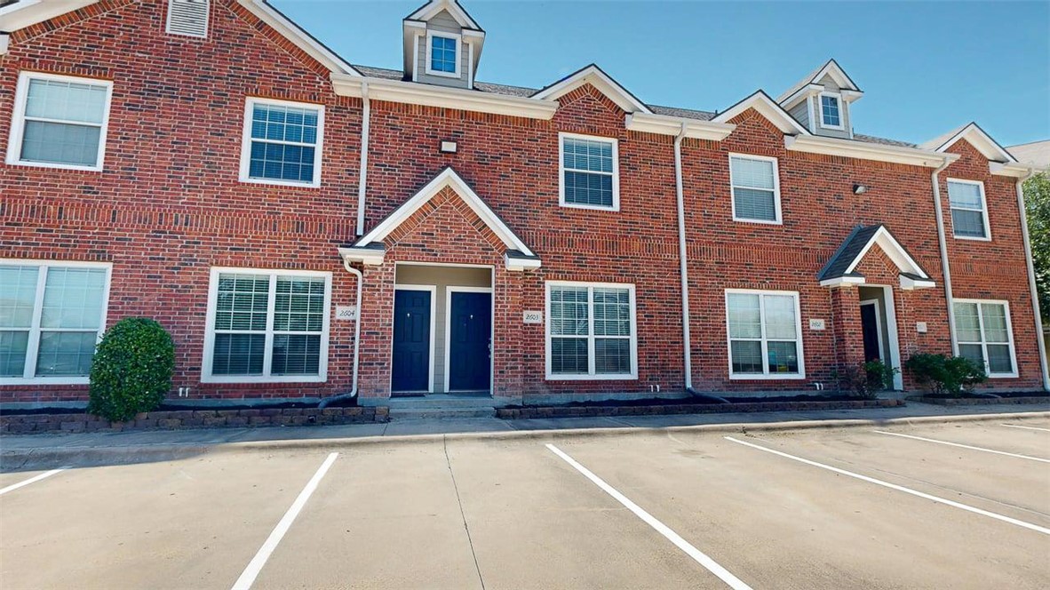 1198 Jones-Butler Road, Unit 2603 College Station, TX 77840 - Photo 27 of 29 a front view of a house with a yard