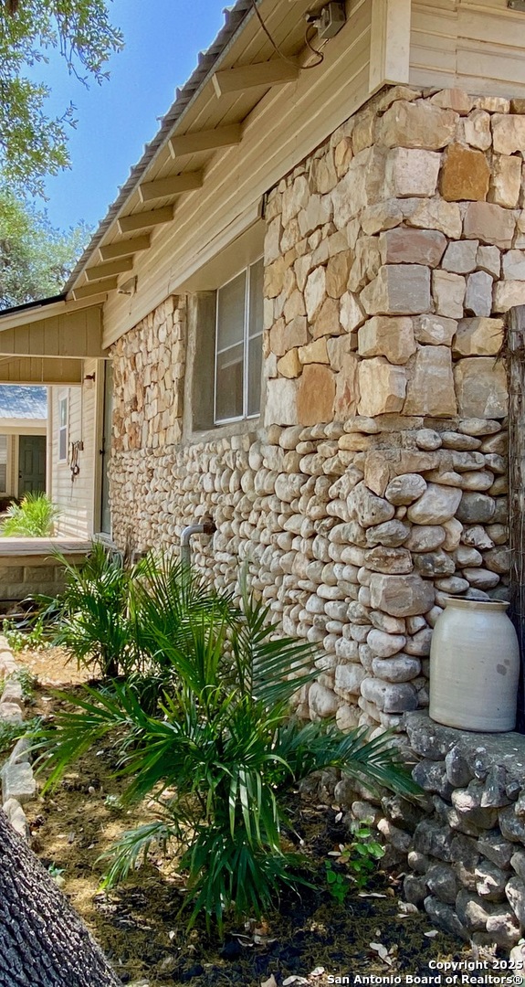 512 County Road 348 Concan, TX 78838 - Photo 11 of 39 a backyard of a house with lots of green space