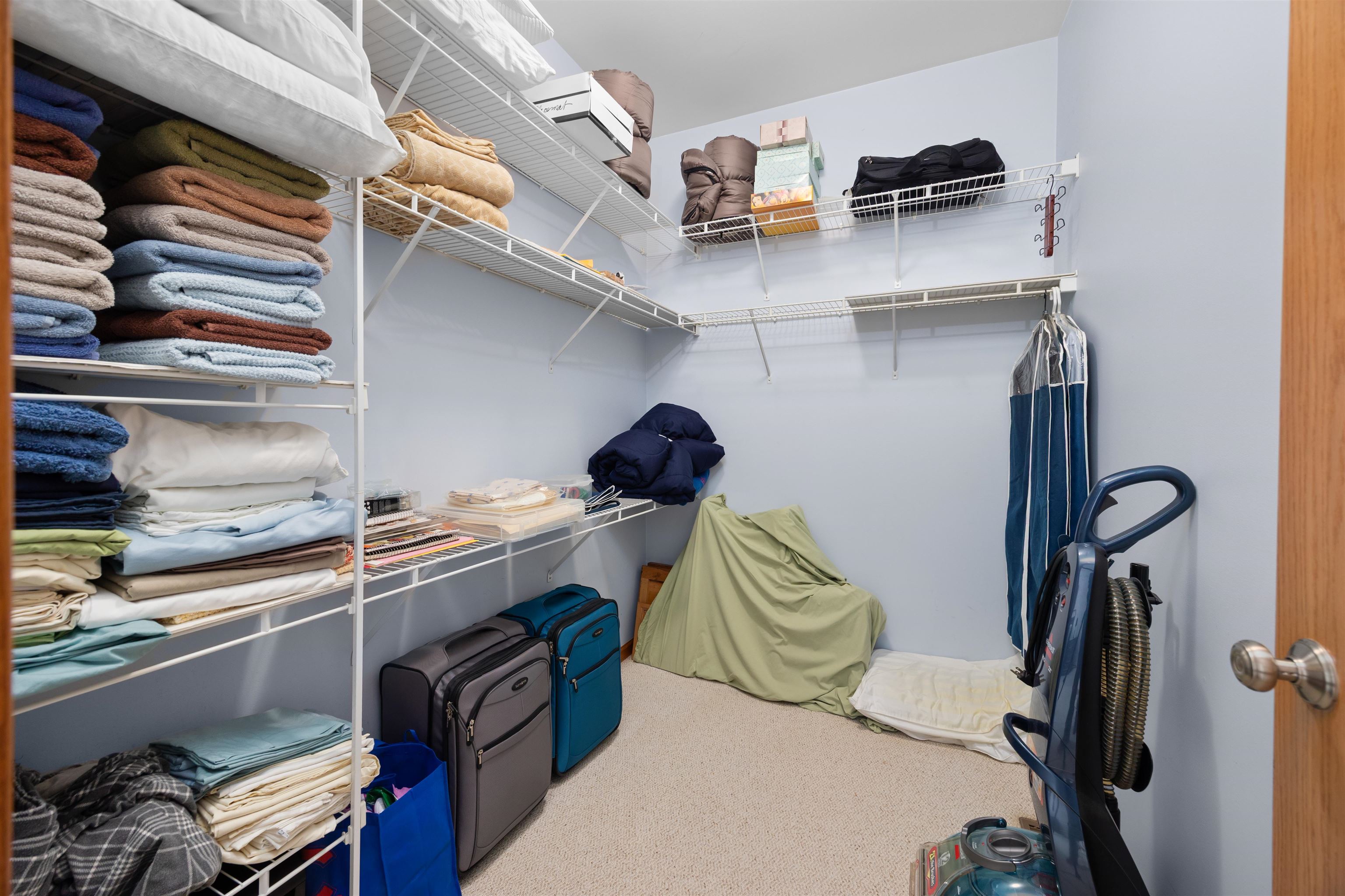 306 Winding Trail Genoa, IL 60135 - Photo 12 of 25 a kitchen with a refrigerator and a stove