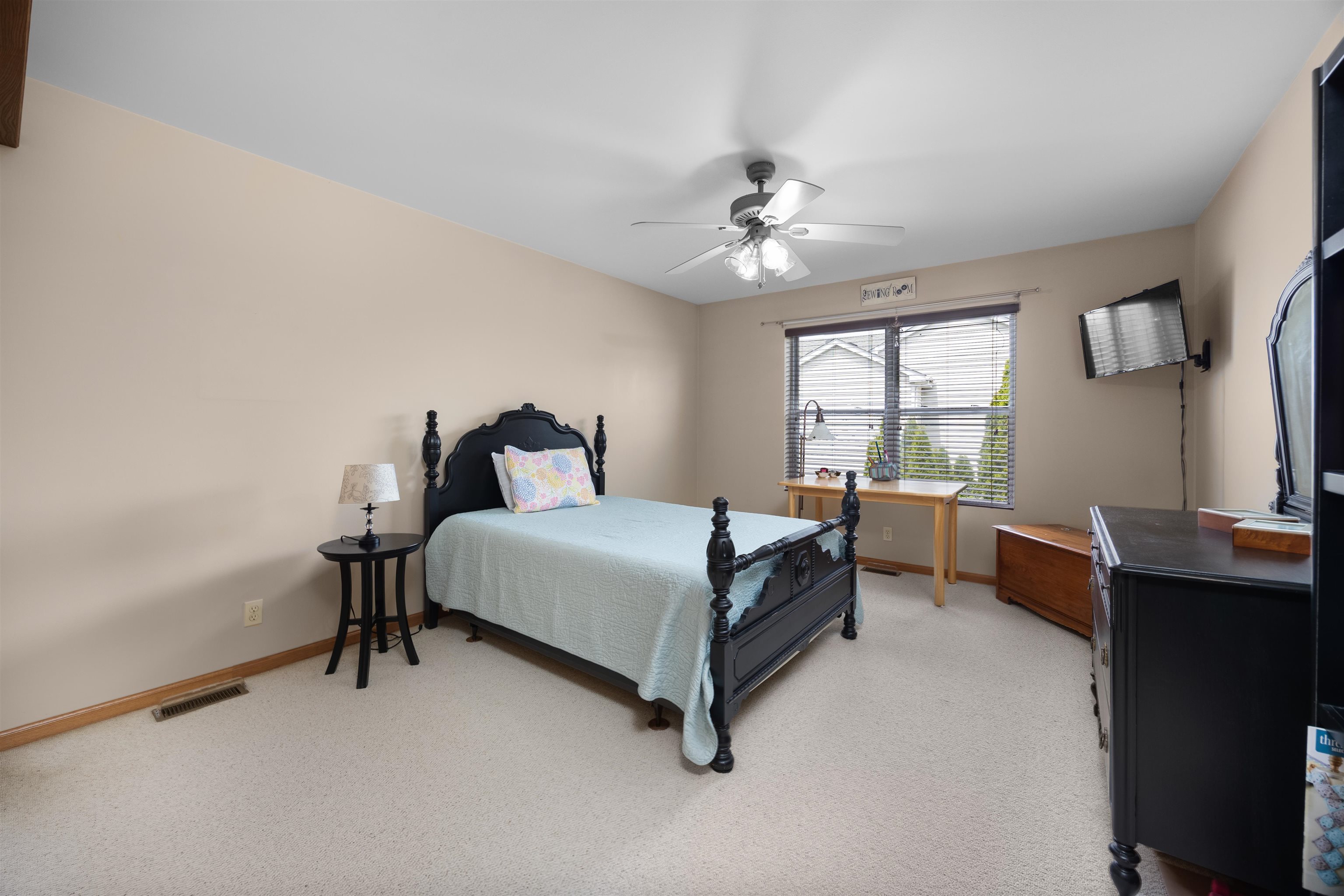 306 Winding Trail Genoa, IL 60135 - Photo 19 of 25 a bedroom with a bed chair and window