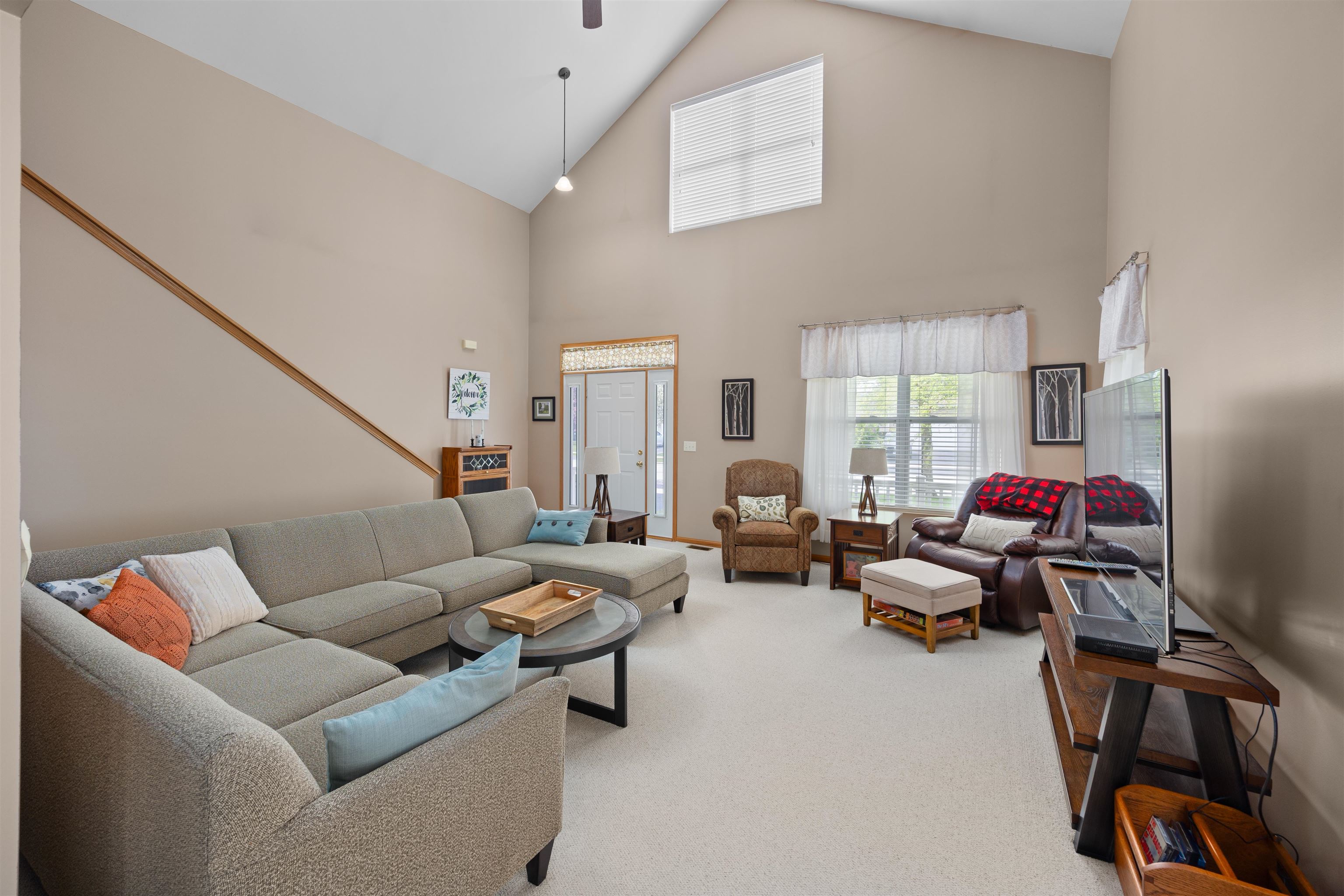 306 Winding Trail Genoa, IL 60135 - Photo 5 of 25 a living room with furniture and a window