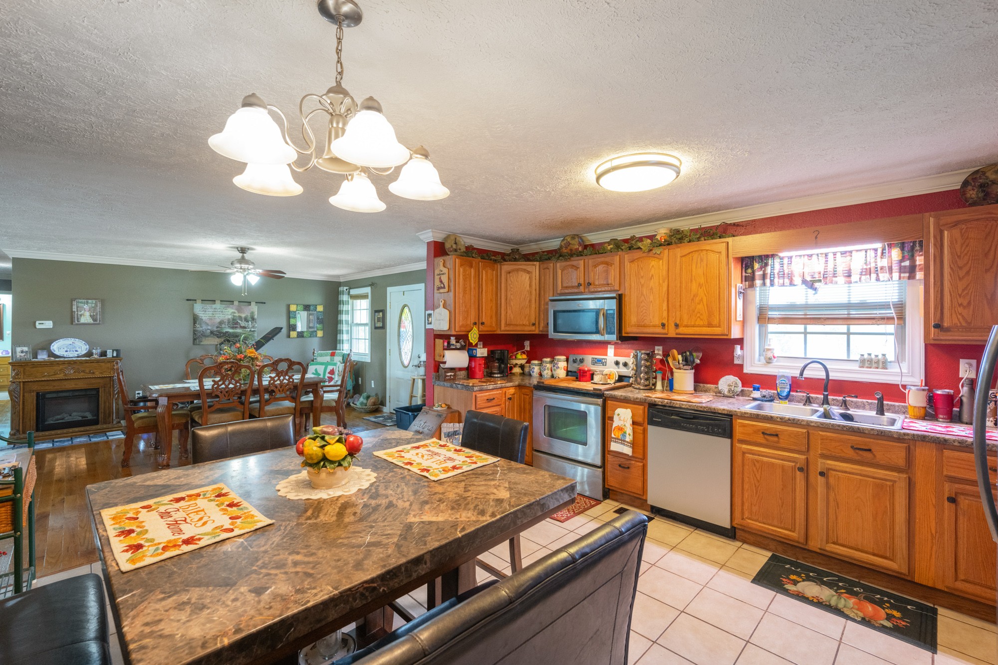 1354 Brandon Road Huntingdon, TN 38344 - Photo 25 of 37 a large kitchen with a table and chairs