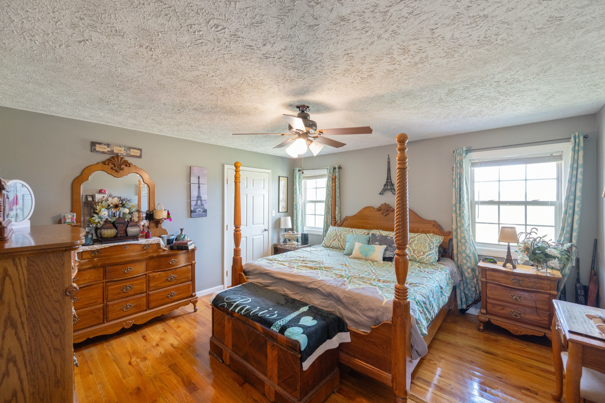 1354 Brandon Road Huntingdon, TN 38344 - Photo 33 of 37 a bedroom with a bed and wooden floor