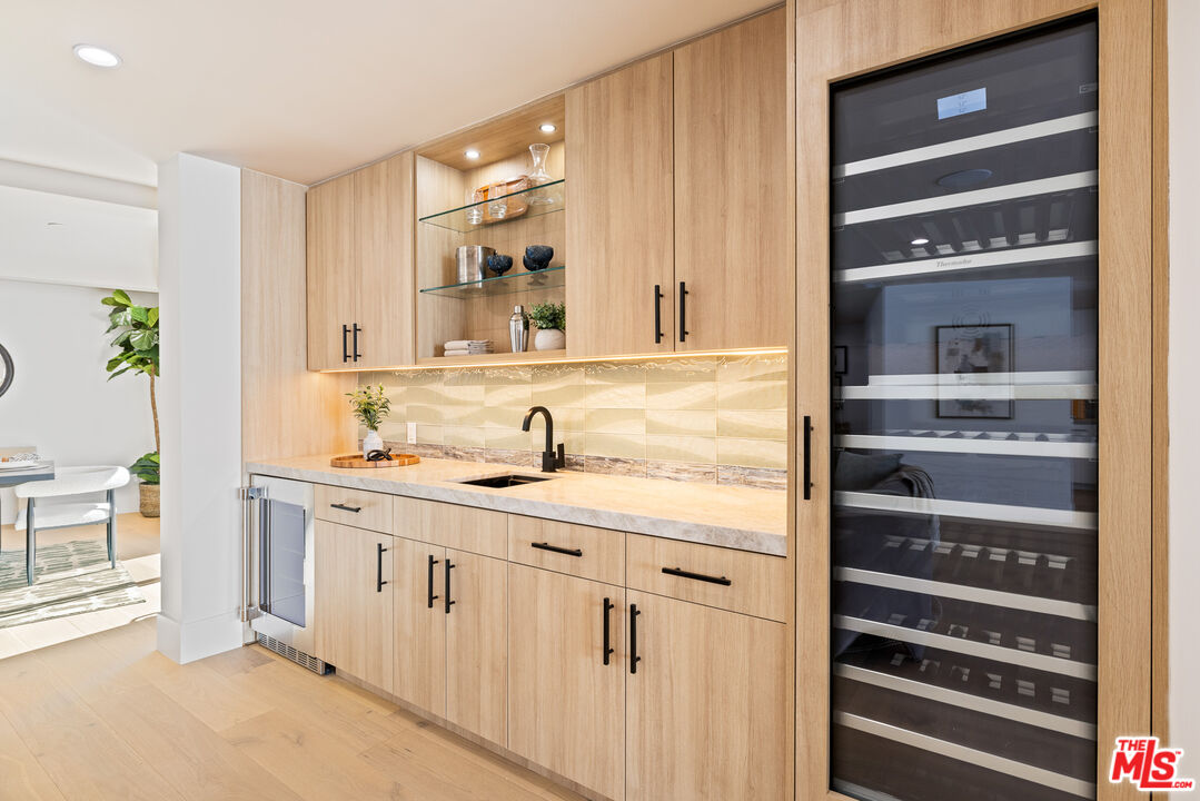 2256 Nichols Canyon Road Los Angeles, CA 90046 - Photo 9 of 45 a bathroom with a sink a mirror and a shower