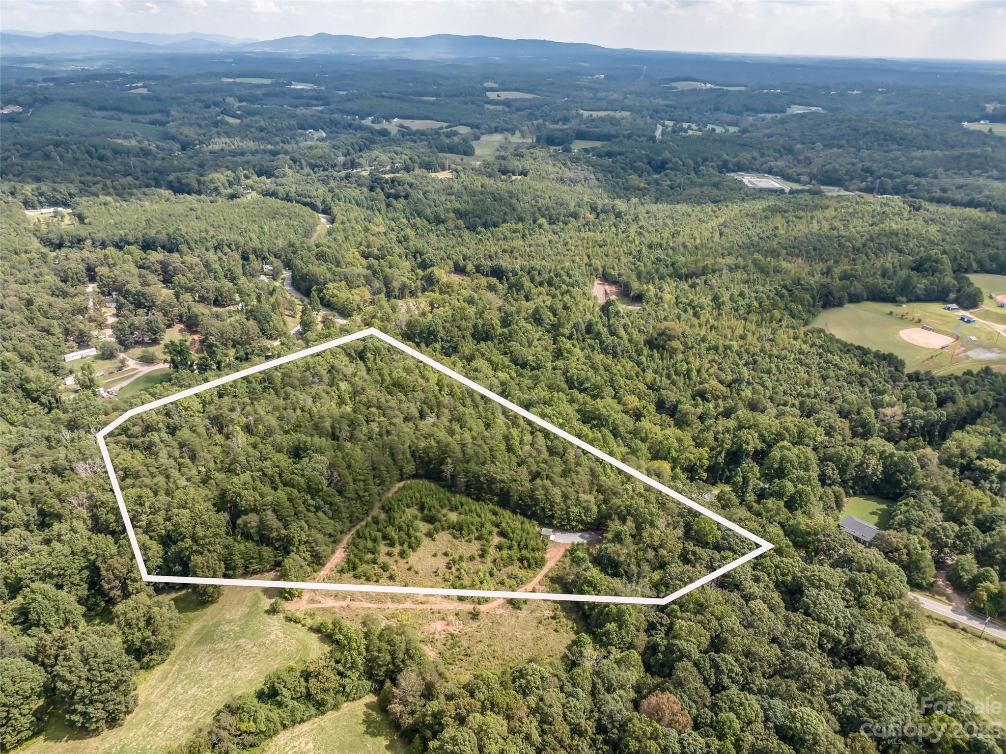 1074 Old Ballpark Road Spindale, NC 28160 - Photo 3 of 20 a view of a tennis court