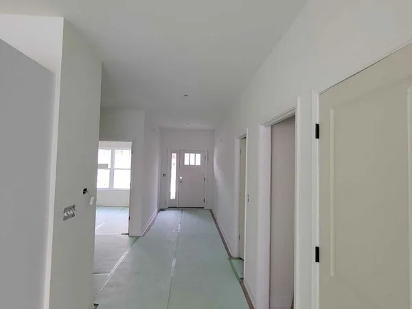 a view of gallery with windows