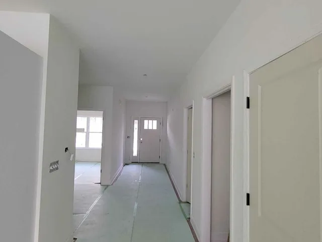 a view of gallery with windows