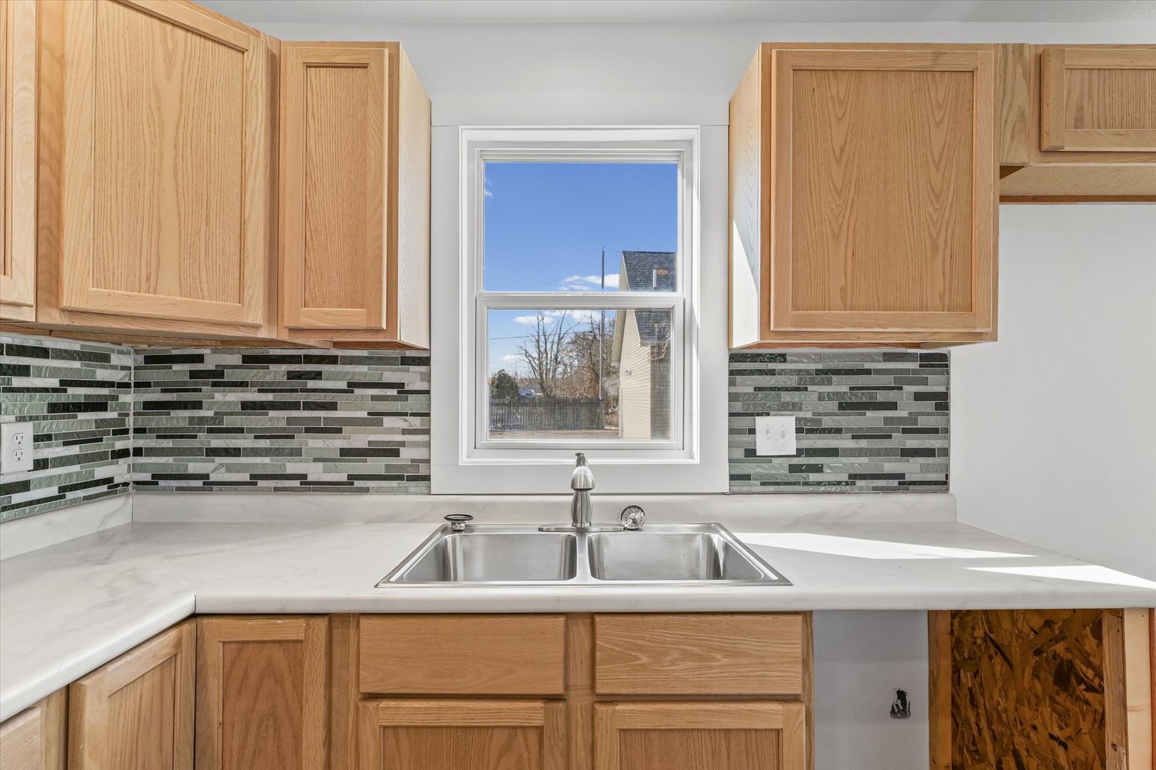 325 North Market Street Hoopeston, IL 60942 - Photo 11 of 35 a kitchen with a sink and cabinets