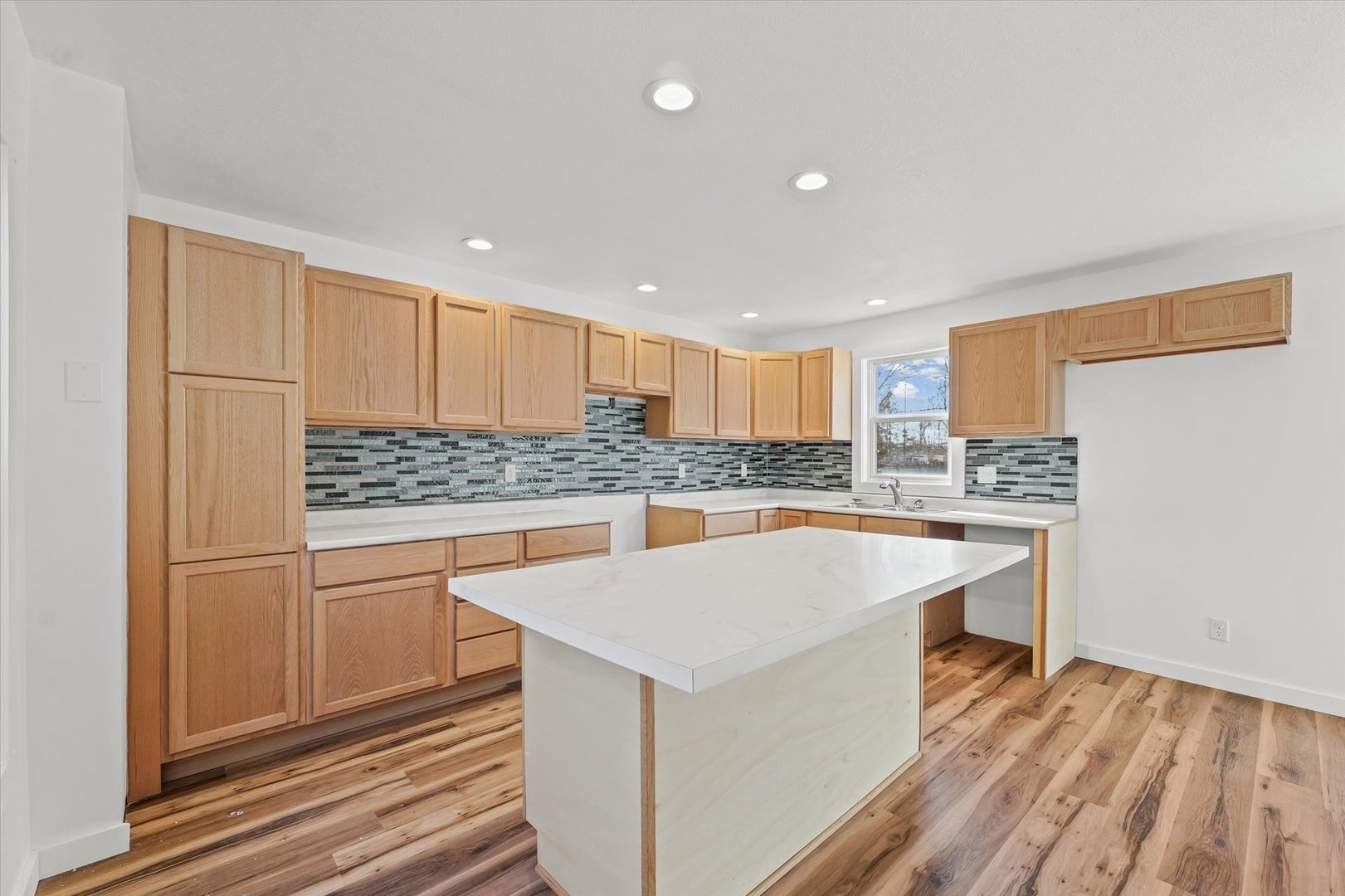 325 North Market Street Hoopeston, IL 60942 - Photo 9 of 35 a kitchen with white cabinets and counter space