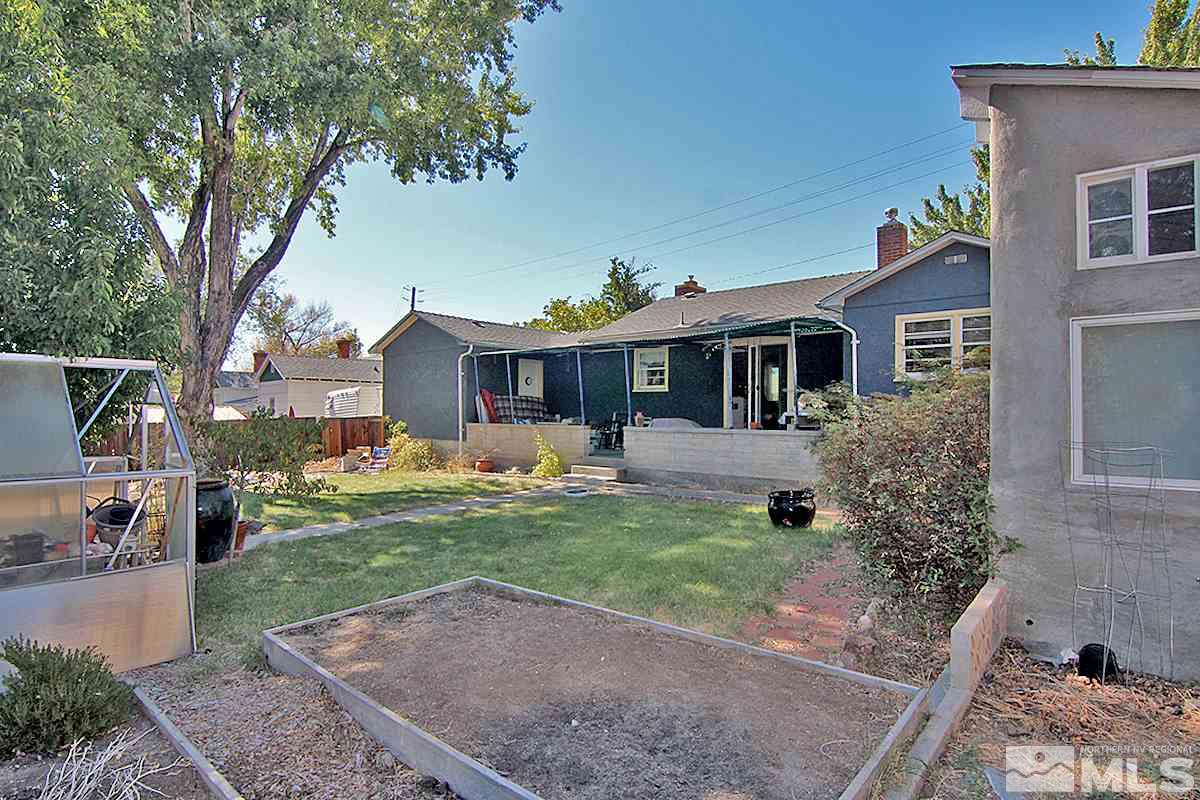 1420 Keystone Avenue Reno, NV 89503 - Photo 8 of 22 a front view of a house with a garden
