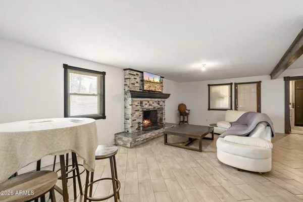 a living room with couch and a table