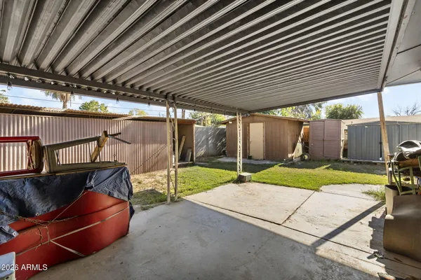 a view of a house with basketball court