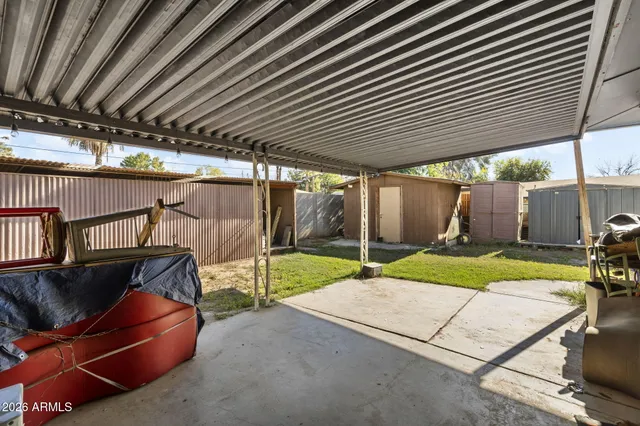 a view of a house with basketball court