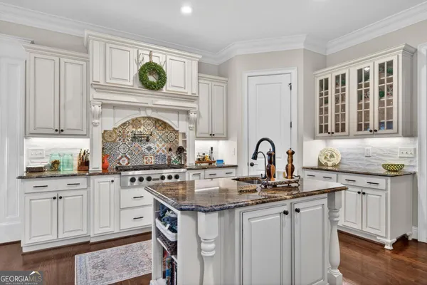 a bath room with a couch and a potted plant