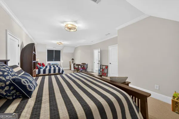 a view of a lake with a yard