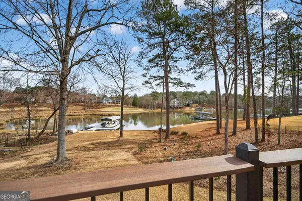 a kitchen with stainless steel appliances granite countertop a stove and cabinets