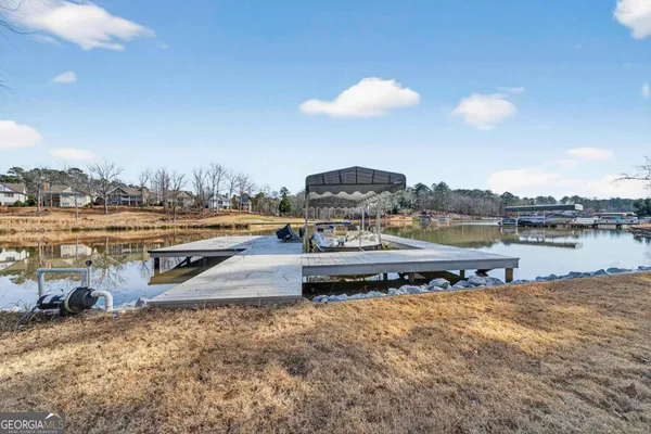 a view of a livingroom with furniture window and wooden floor