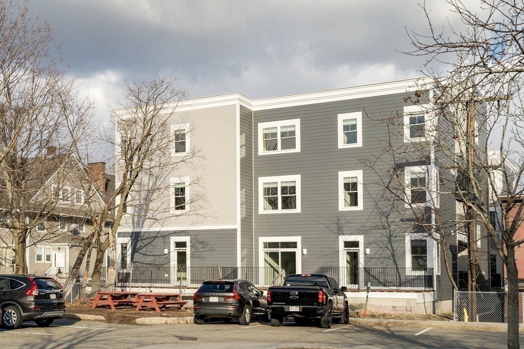 429 Cherry Street, Unit 12 Newton, MA 02465 - Photo 20 of 20 a car parked in front of a building