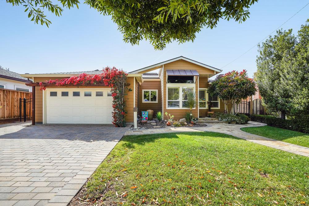 475 Rincon Avenue Sunnyvale, CA 94086 - Photo 1 of 58 a front view of a house with a yard and garage