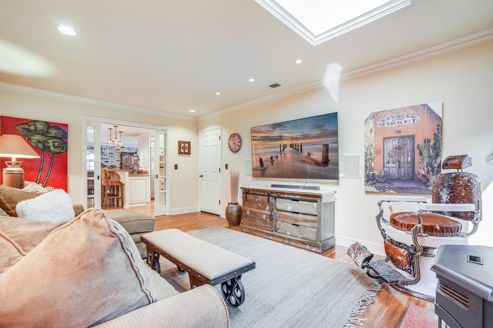 475 Rincon Avenue Sunnyvale, CA 94086 - Photo 11 of 58 a living room with furniture and a flat screen tv