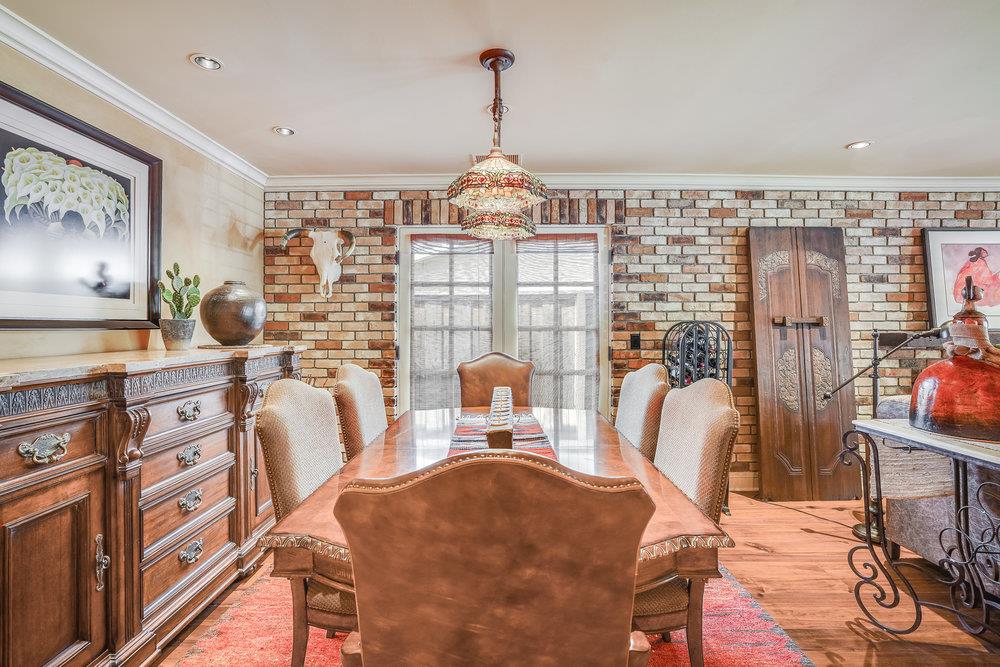 475 Rincon Avenue Sunnyvale, CA 94086 - Photo 16 of 58 a view of a dining room with furniture and chandelier