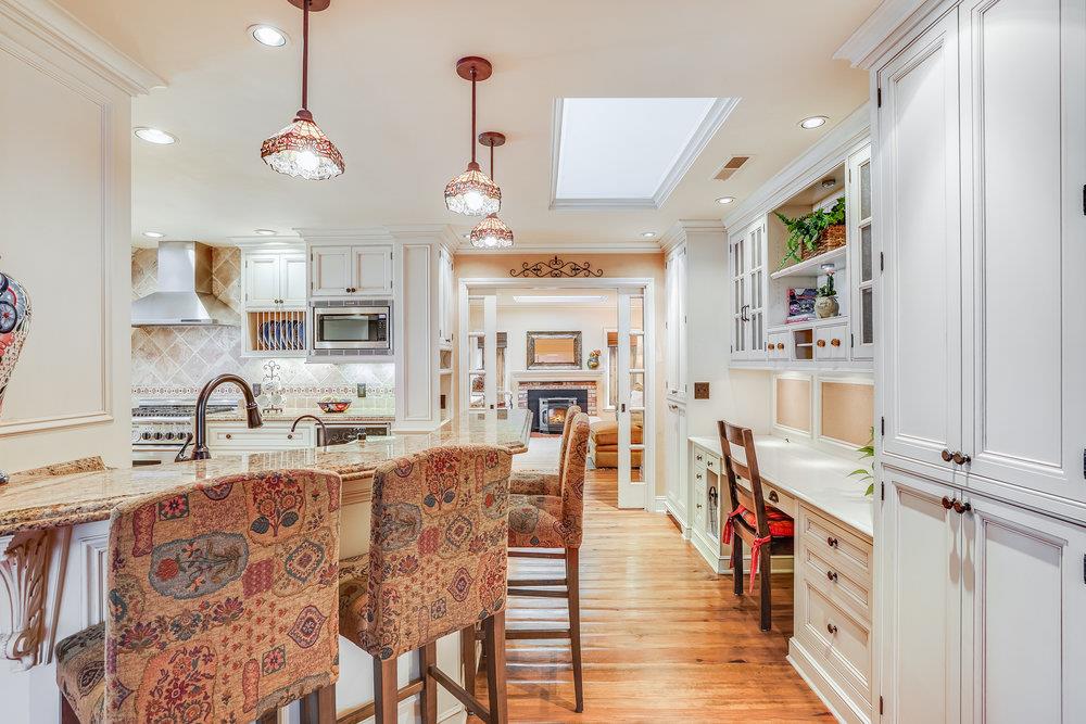 475 Rincon Avenue Sunnyvale, CA 94086 - Photo 17 of 58 a large kitchen with a table and chairs