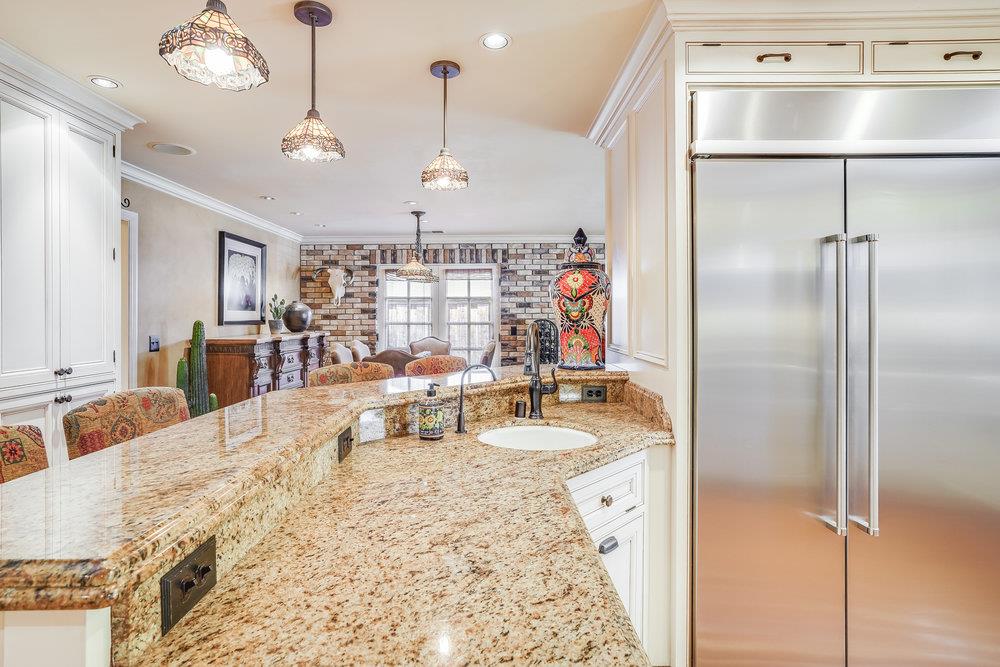 475 Rincon Avenue Sunnyvale, CA 94086 - Photo 19 of 58 a view of a kitchen and kitchen island