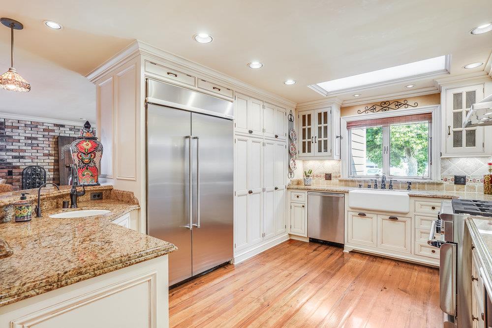 475 Rincon Avenue Sunnyvale, CA 94086 - Photo 25 of 58 a kitchen with a refrigerator sink and stove