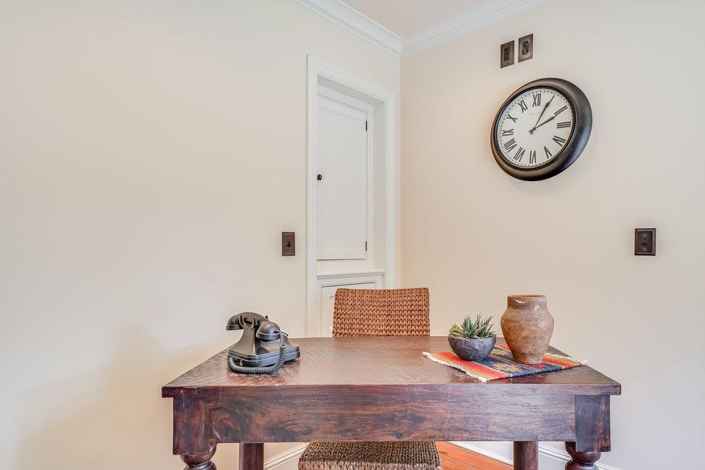 475 Rincon Avenue Sunnyvale, CA 94086 - Photo 32 of 58 a view of dining area with a table and a clock