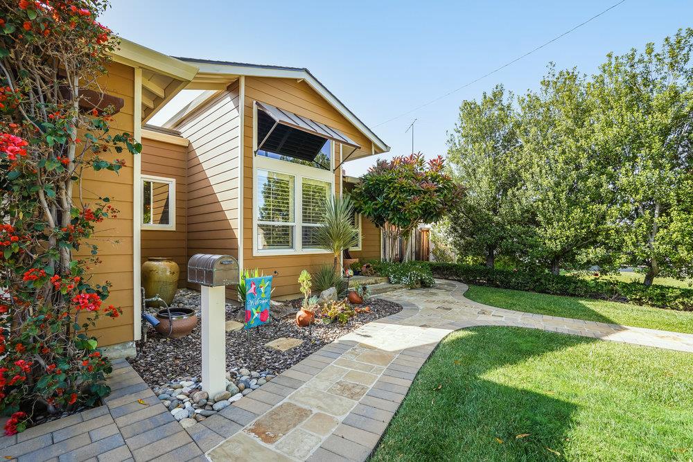475 Rincon Avenue Sunnyvale, CA 94086 - Photo 4 of 58 a front view of a house with a yard