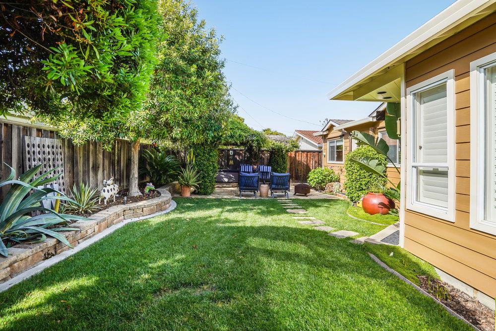 475 Rincon Avenue Sunnyvale, CA 94086 - Photo 45 of 58 a view of a chair and table in backyard of the house