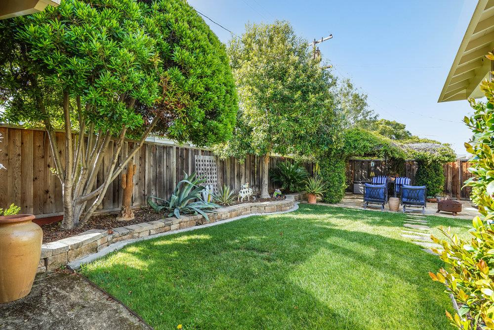 475 Rincon Avenue Sunnyvale, CA 94086 - Photo 46 of 58 a view of a chairs and backyard with a slide