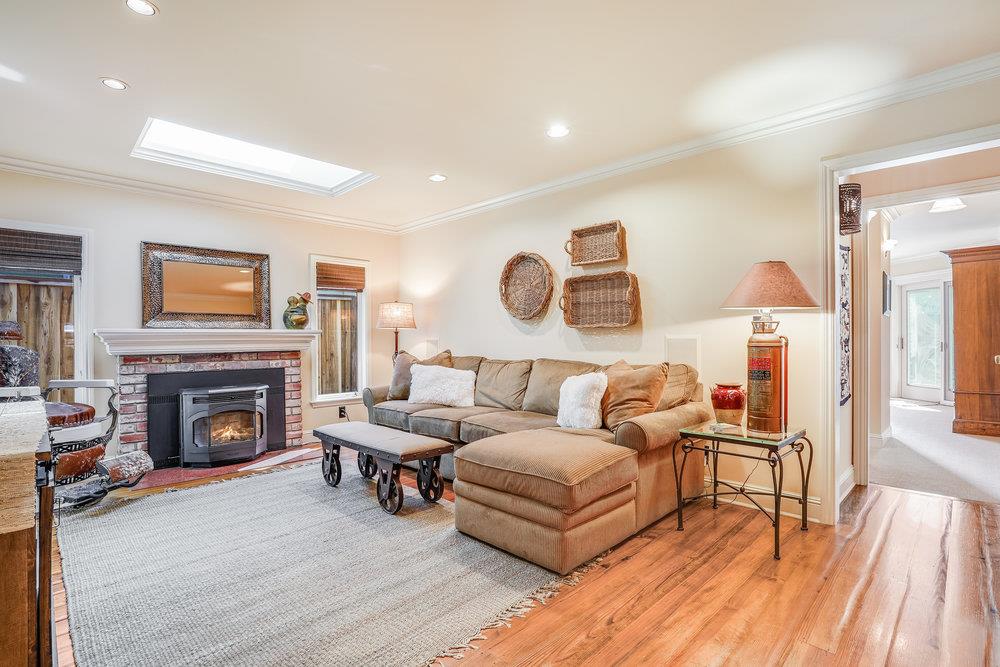 475 Rincon Avenue Sunnyvale, CA 94086 - Photo 10 of 58 a living room with furniture and a fireplace