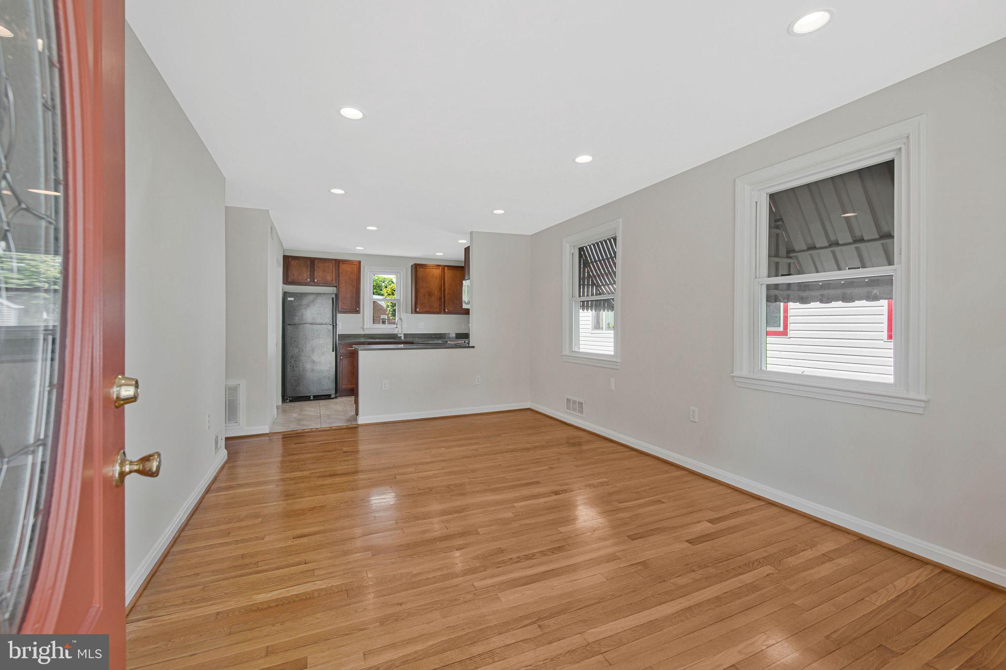 5007 Somerset Road Riverdale, MD 20737 - Photo 4 of 32 Living room with gorgeous oak floors