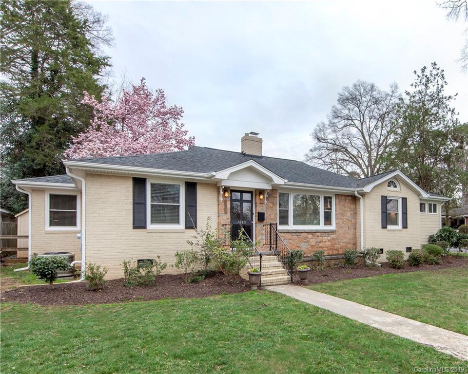 4143 Pineview Road Charlotte, NC 28211 - Photo 1 of 22 front view of a house with a yard