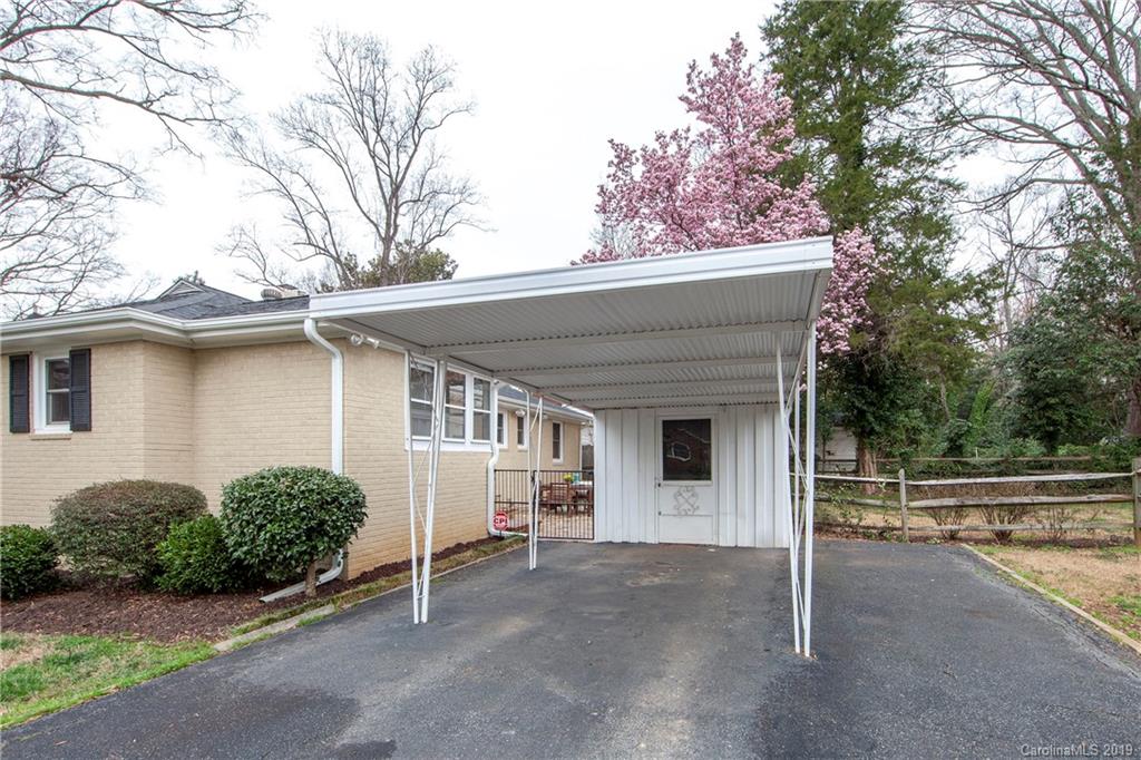 4143 Pineview Road Charlotte, NC 28211 - Photo 21 of 22 a view of a house with a garage