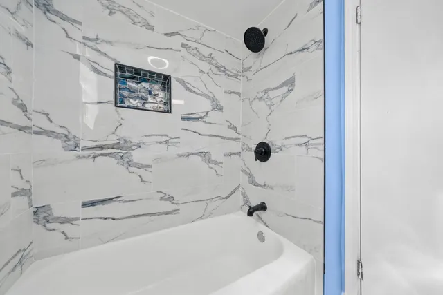 a bathroom with a bathtub