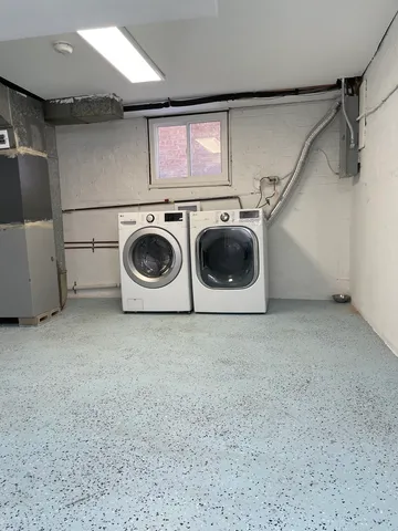 a view of a house with a yard and plants