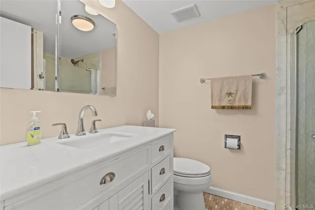 a bathroom with a mirror