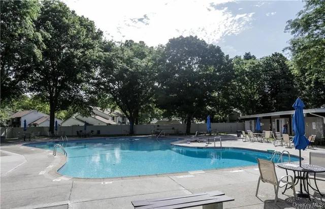 a view of hall way with fireplace