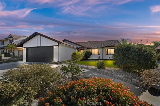 a view of a house with a swimming pool