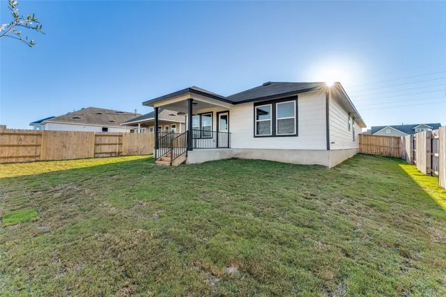 a house view with a garden space