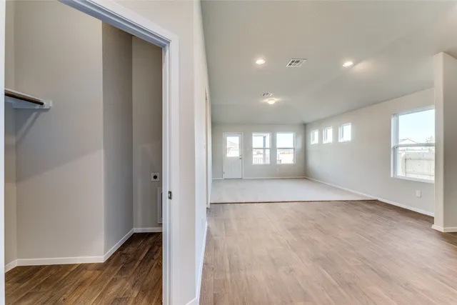 a view of an empty room and window