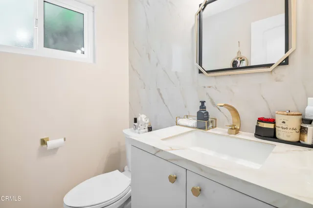 a bathroom with a sink and a toilet