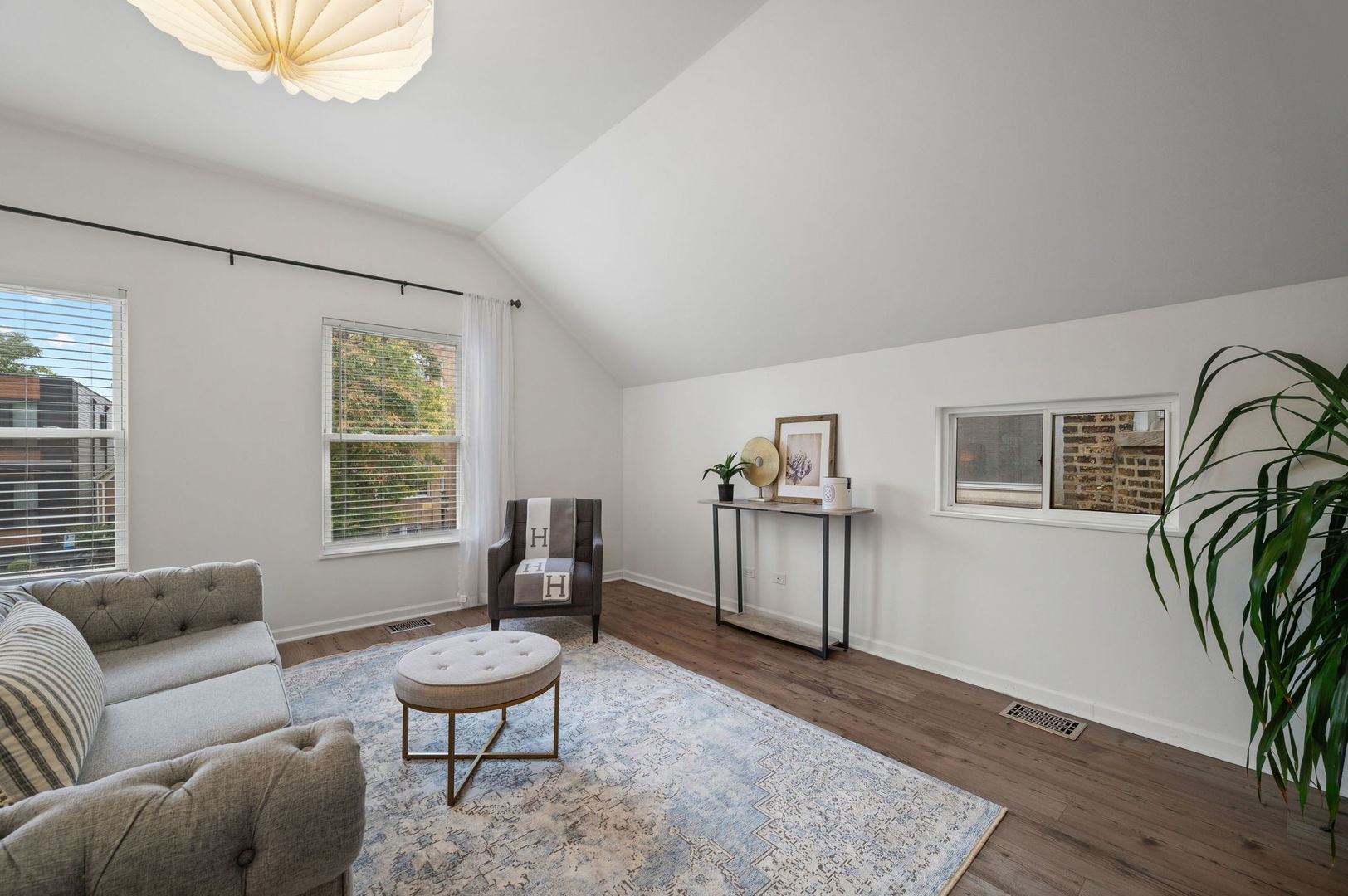 3343 West Potomac Avenue Chicago, IL 60651 - Photo 19 of 44 a living room with furniture and a window