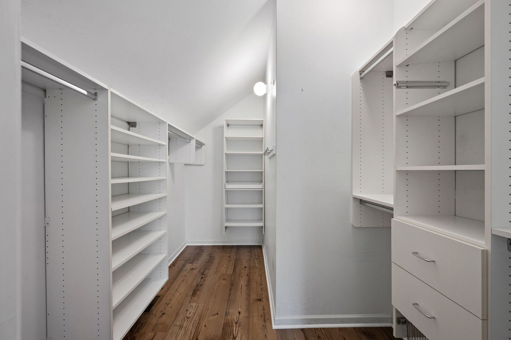 3343 West Potomac Avenue Chicago, IL 60651 - Photo 20 of 44 a view of walk in closet with empty racks