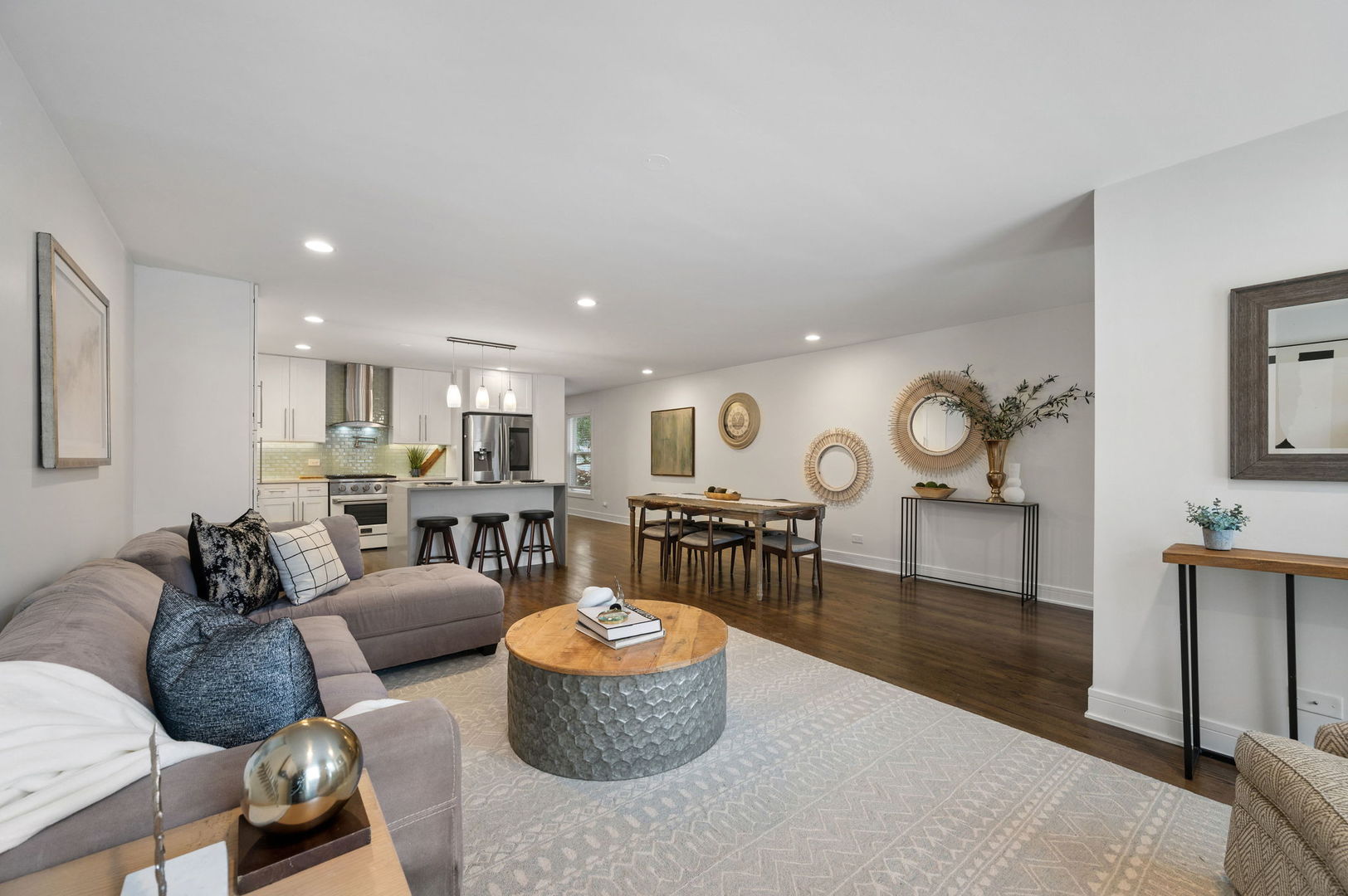 3343 West Potomac Avenue Chicago, IL 60651 - Photo 7 of 44 a living room with furniture kitchen view and a table