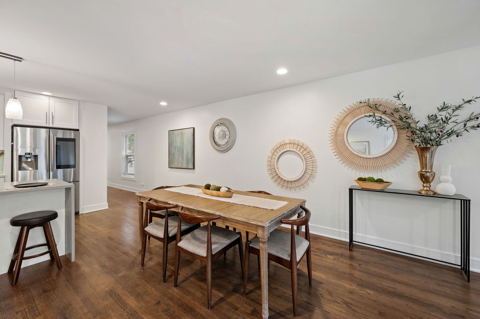 3343 West Potomac Avenue Chicago, IL 60651 - Photo 8 of 44 a view of a dining room with furniture and wooden floor