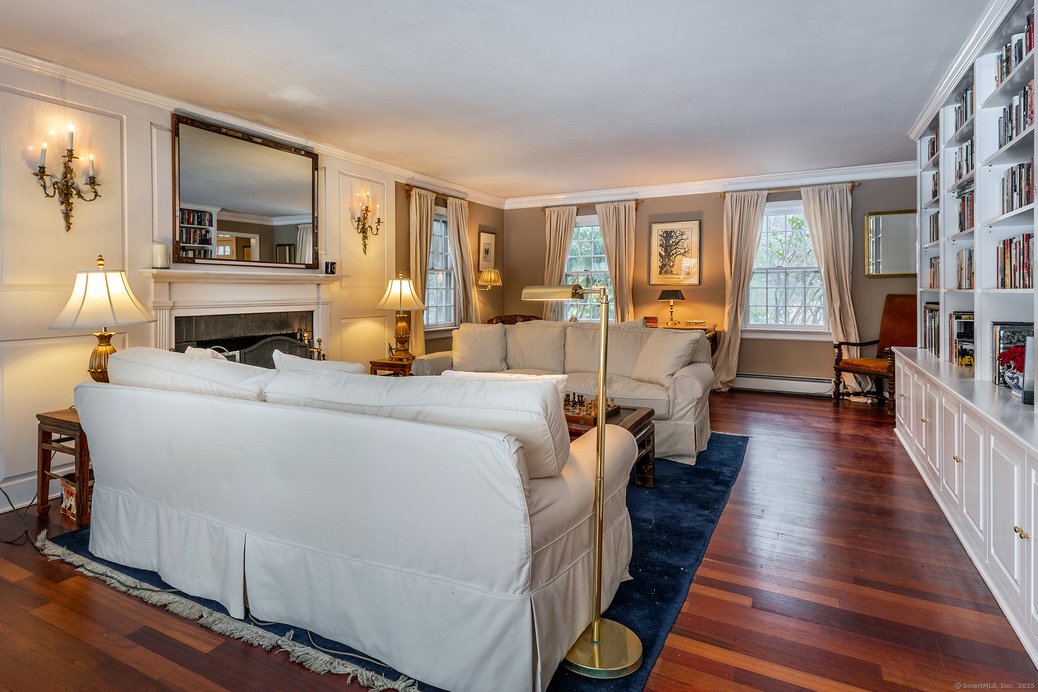 5 North Street Roxbury, CT 06783 - Photo 14 of 28 a bed room with bed and balcony with wooden floor